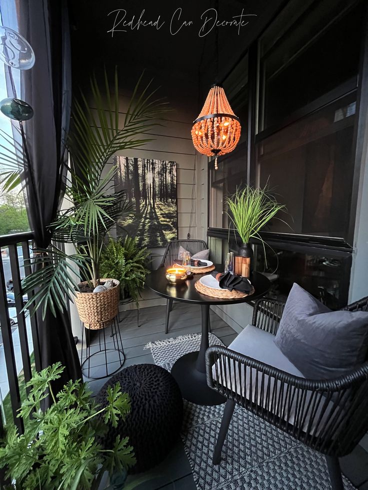 an outdoor patio with wicker furniture and potted plants on the balcony, surrounded by greenery