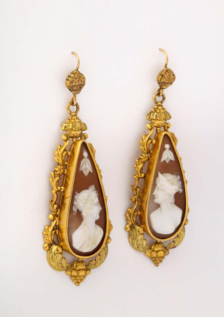 For Sale on 1stDibs - The rare, collectable metal, Pinchbeck, is setting for 18th century shell cameos of a male and female god and goddess. The earrings are all original including Harrow Faire, God And Goddess, Goddess Earrings, Edgy Jewelry, Male And Female, Gods And Goddesses, Chandelier Earrings, 18th Century, Shells