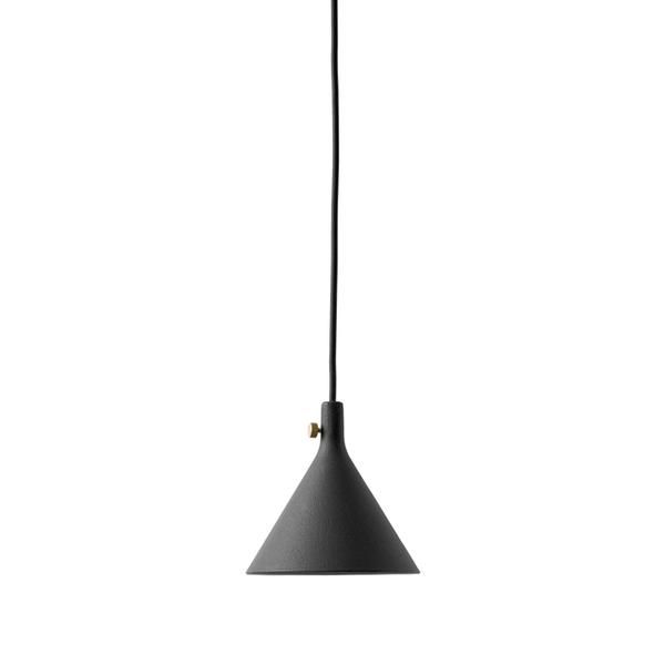 a black light hanging from the ceiling on a white background with no one in it