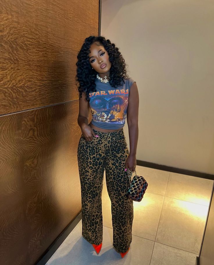 Bronze Jeans Outfit, De’arra Outfits, Cheetah Boots Outfit Winter, Hbcu Yard Outfits, Leopard Skin Outfit, Leopard Print Trousers Outfit Winter, Leapord Print Jean Outfits, Leopard Leggings Outfit Winter, Leopard Pants Outfit Black Women