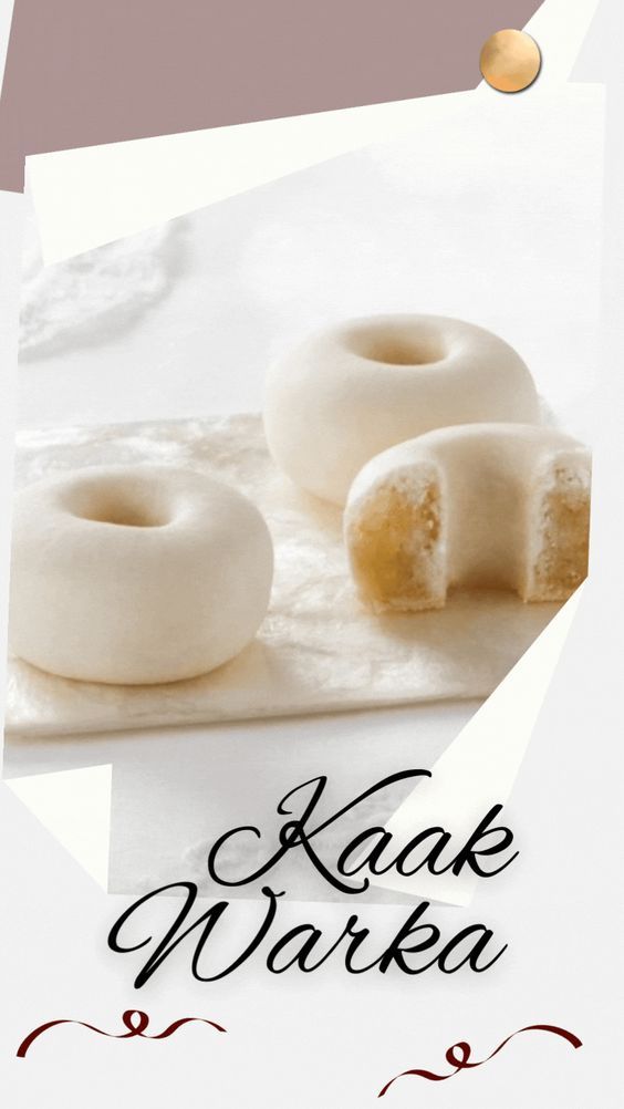 two white donuts sitting on top of a table with the words keak marka