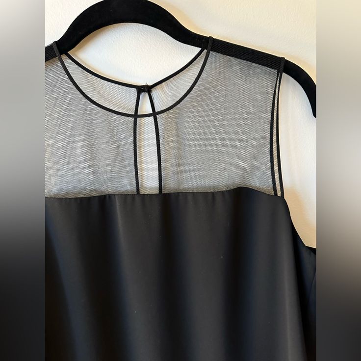 Beautiful Top That Subtly Shows Off Your Dcollet Through The Fine Mesh. It’s A Roomy Size S. Never Worn, Excellent Condition. Limited Edition, Rare Find! Elegant Black Sleeveless Camisole, Summer Evening Top With Sheer Bodice, Sleeveless Sheer Mesh Top For Night Out, Sheer Sleeveless Mesh Top For Night Out, Chic Sheer Tank Top For Party, Sheer Tank Top For Evening Wear, Sheer Mesh Cami Top For Party, Elegant Black Tank Top, Elegant Black Camisole For Night Out