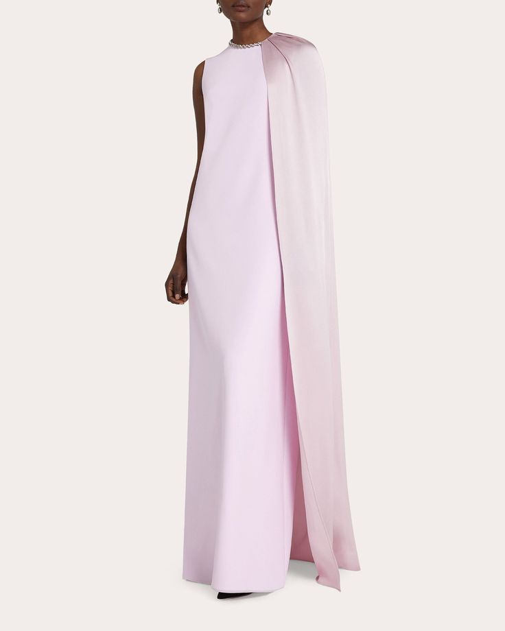 Cape Satin Dress, Haute Couture Gowns 2024, Luxury Silk Gown With Cutdana Details, Luxury Cape With Draped Cape Sleeves, Luxury Draped Evening Cape, Luxury Asymmetrical Bias Cut Dress, Designer Pink Dress With Cape Sleeves, Luxury Pre-draped Evening Dress With Cape Sleeves, Luxury Pre-draped Gown With Asymmetrical Neckline