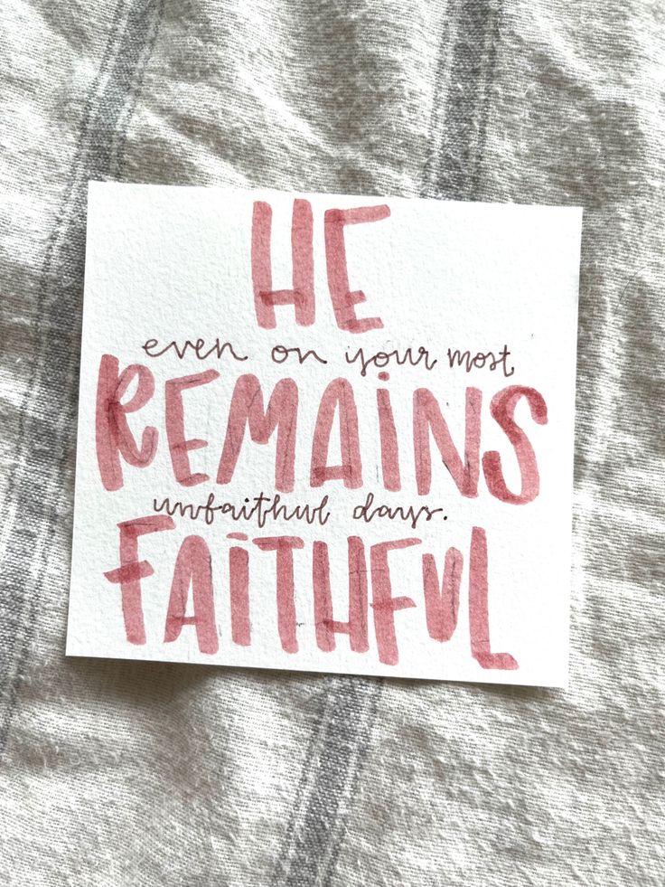 a piece of paper with the words he remains faith written in red ink on it