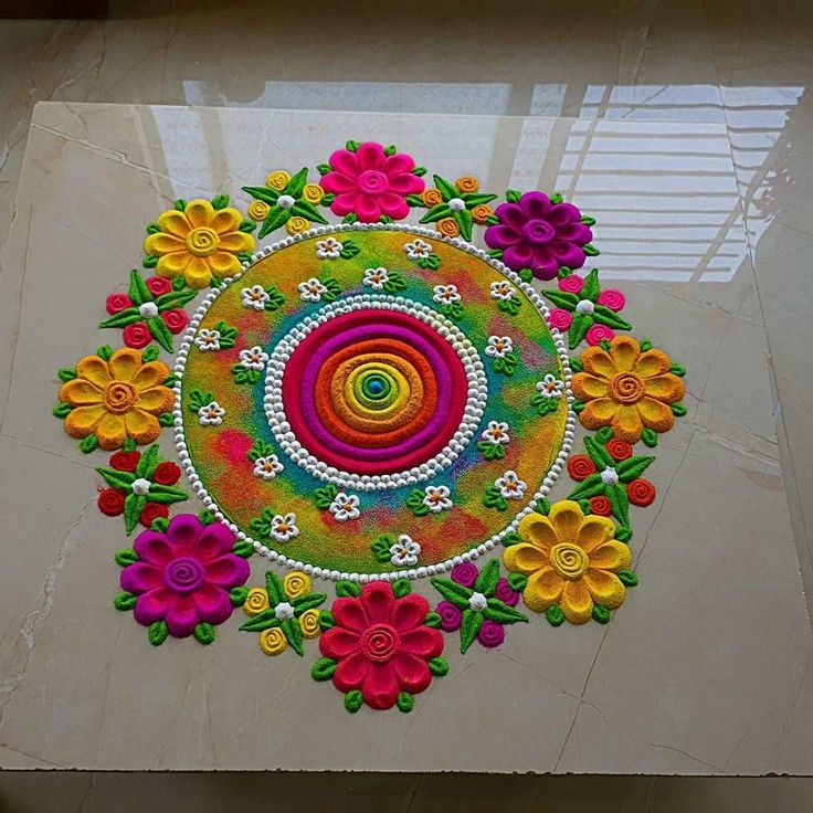 a colorful flower design is on the floor