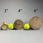 four tennis balls are lined up next to each other on a gray background with measurements