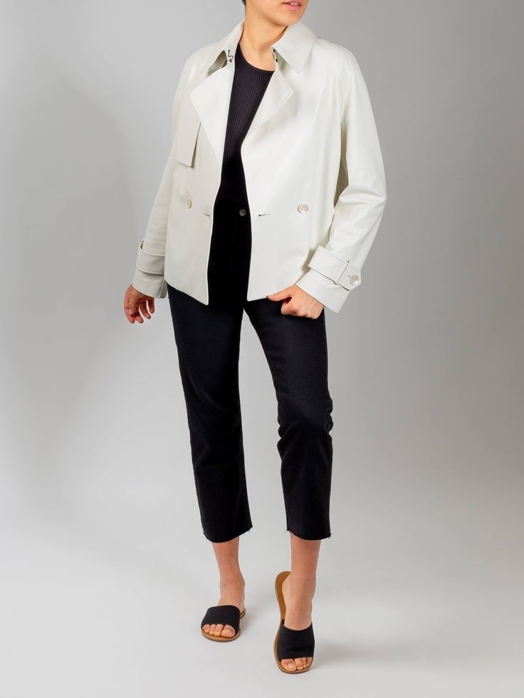 Simplicity and elegance in a single Daisy Italian Lambskin Leather Jacket. An iconic heritage piece is given a contemporary touch, ready to wear in all seasons. With a tailored but relaxed cut, it manages to accentuate the waist with a belt. Winter Leather Jacket With Belt Loops For Work, Fall Leather Jacket With Concealed Placket For Work, Chic Pea Coat With Concealed Placket For Work, Classic Leather Pea Coat For Work, Timeless Outerwear With Belted Cuffs, Timeless Outerwear With Belted Cuffs For Work, Timeless Belted Outerwear For Spring, Fitted Leather Jacket With Belt Loops For Work, Chic Belted Pea Coat For Business