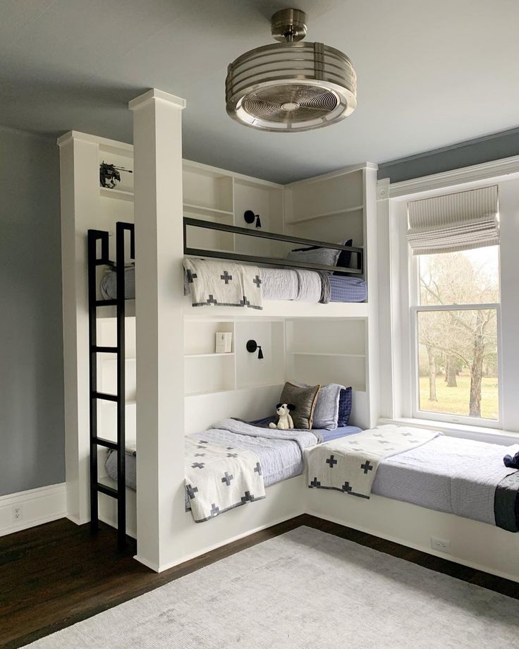 custom-designed and built bunk beds for 5 young boys with bright white and blue details in a sunny and cheerful room Built In Bunk Beds Angled Ceiling, Corner Loft Beds Diy, Bunk Room Ideas, Bunk Bed Room, Bunk Bed Rooms, Bunk Beds Built In, Built In Bed, Bunk Rooms, Bunk Bed Designs