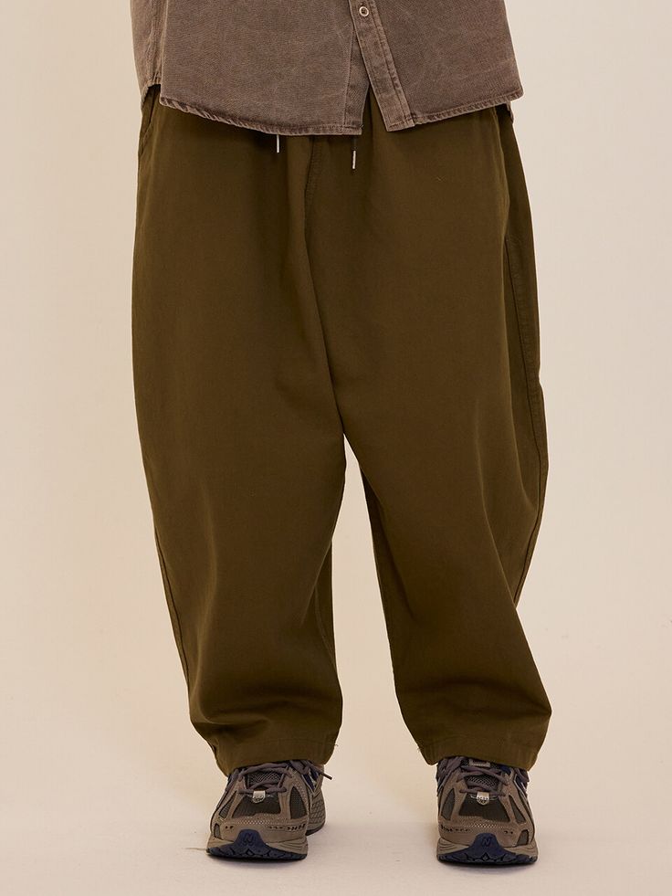 Editor's NotesCARGOBROS' basic banding pants are made of 100% cotton material cargo. With the comfortable design and material, these pants can be your go-to pants.- Banding closure- Balloon fit silhouette- Drawstring at waist- 100% cotton material- Versatile and casual itemMeasurements(in.)One size- Total length: 36.61 in.- Waist: 12.99 - 19.29 in.- Thigh: 17.71 in.- Front rise: 15.74 in.- Hem: 8.66 in.Model infoMan - 5'74 Composition & Care- 100% Cotton- Please check the care labe Solid Cotton Utility Cargo Pants, Military Style Long Pants With Relaxed Fit, Khaki Cargo Style Sweatpants, Cotton Cargo Style Sweatpants, Khaki Cotton Pants With Pockets, Green Cotton Work Pants With Side Pockets, Khaki Cotton Pants For Fall, Khaki Utility Parachute Pants With Loose Fit, Solid Color Relaxed Fit Cargo Pants