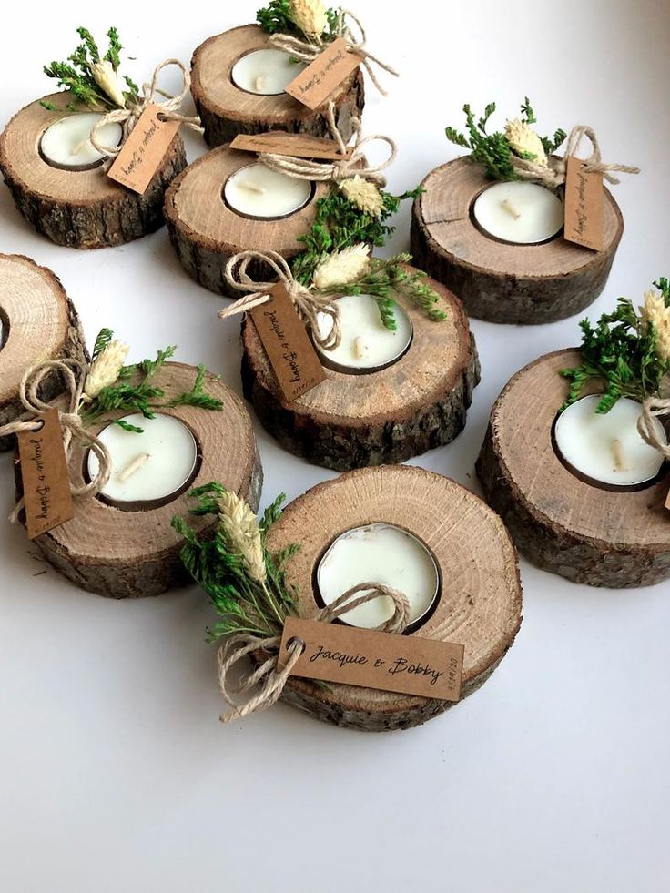 small wooden slices with candles tied to them