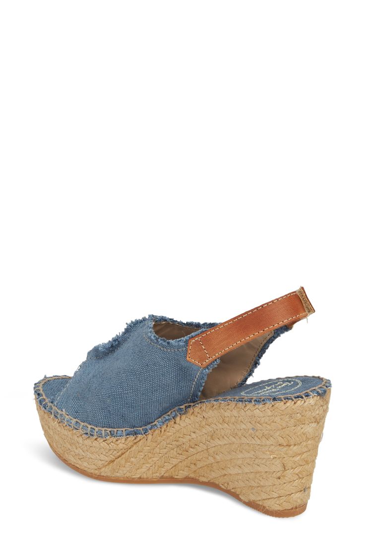 A cotton canvas sandal takes the seamed construction of a classic clog and combines it with an espadrille jute wedge for a fresh look. Frayed edges and a stonewashed finish further the relaxed vibe, while a slightly raised toe design eases natural movement while walking. Style Name:Toni Pons 'Lugano' Espadrille Wedge Sandal (Women). Style Number: 1122741. Vacation Wedge Sandals With Rubber Sole, Vacation Wedge Heel Sandals With Rubber Sole, Casual Espadrille Wedge Sandals For Summer, Casual Platform Espadrilles For Summer, Casual Summer Platform Espadrilles, Casual Summer Espadrilles With Platform, Summer Wedge Sandals With Rubber Sole, Summer Canvas Wedge Sandals With Closed Toe, Blue Espadrille Wedge Sandals For Spring