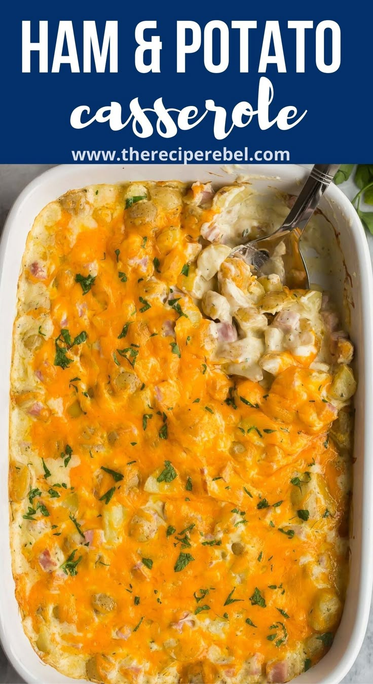 ham and potato casserole in a white dish with a serving spoon on the side