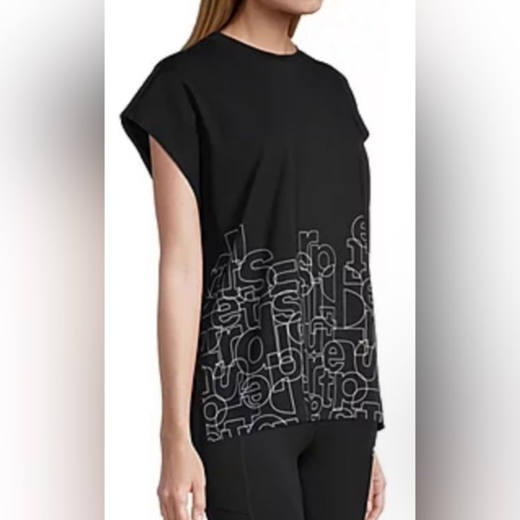 Sports Illustrated Top Black Graphic Print Top For Workout, Black Athleisure Tops, Black Tops For Sports In Spring, Black Moisture-wicking Relaxed Fit Tops, Spring Black Tops For Sports, Black Relaxed Fit Sportswear Top, Black Workout T-shirt For Spring, Black T-shirt For Spring Workout, Black Short Sleeve Activewear For Spring