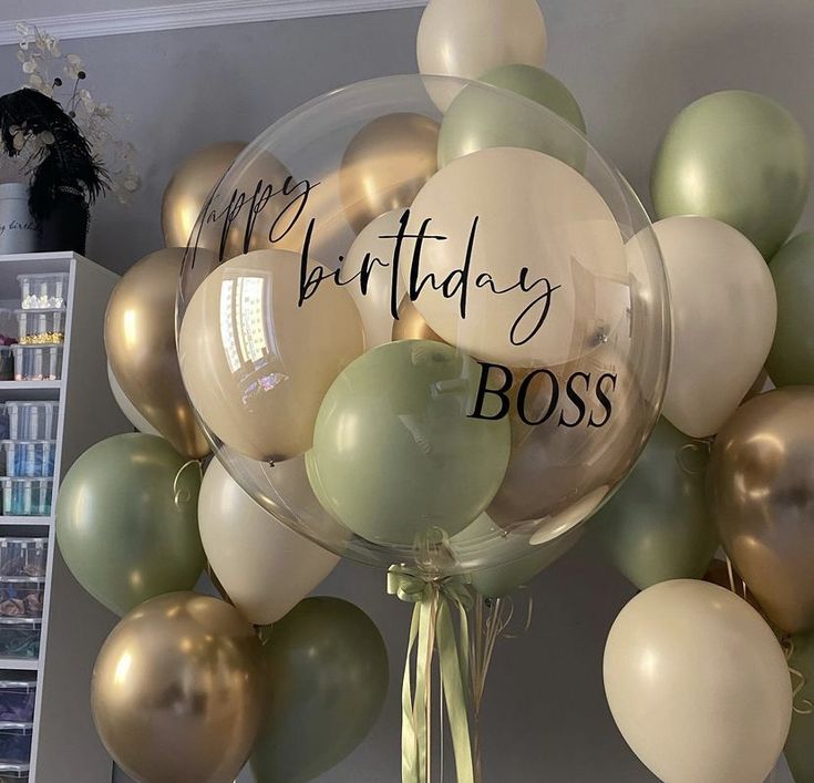 a bunch of balloons that say happy birthday boss