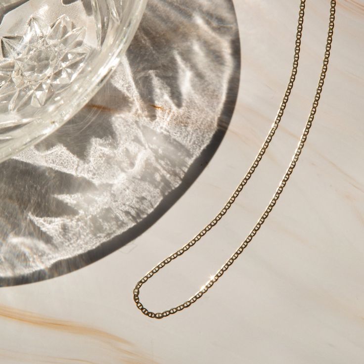 Our Dainty Mariner Chain Necklace is an absolute necessity for your jewelry collection. Its texture and shine add the perfect touch for every occasion. If you’re looking for a necklace to wear every day - this is it! It looks amazing on its own and even better paired with other layering necklaces. Made of 14k solid gold, this necklace is sure to keep its shine and never trouble you with tarnishing or irritation. Get ready for compliments - you're going to love how you look & feel in your Dainty Timeless 14k Rose Gold Chain Necklace, Delicate Chain 14k White Gold Necklace, Everyday Rose Gold Necklace With Box Chain, Everyday Rose Gold Box Chain Necklace, Everyday Fine Jewelry Box Chain Necklace, Delicate Rose Gold Box Chain Necklace, 14k Yellow Gold Box Chain Necklace, Everyday 14k Gold Box Chain Necklace, Timeless Delicate Chain Necklace In Rose Gold