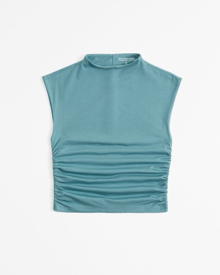 Slim-fitting shell top in our new softAF cotton-modal fabric, with flattering ruching details along the bodice and trendy high-neck detail. Female Features, Business Skirt, Europe Outfits, Shell Top, Shell Tops, High Neck Top, American Clothing, Deep Teal, Understated Elegance