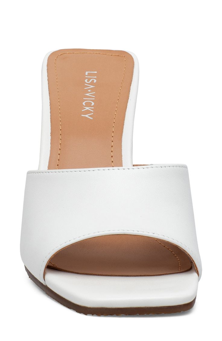 A bold block heel accents the trendy silhouette of a timeless slide sandal with minimalist styling that showcases its premium leather construction. 3" heel Slip-resistant sole Leather upper/synthetic lining/rubber sole Imported Synthetic Block Heels With Heel Loop, White Open Toe Classic Mules, Classic White Mules With Padded Heel, Open Toe Synthetic Mules With Padded Heel, White Open Toe Mules With Contrasting Heel, White Sandals With Block Heel And Deep Heel Cup, White Open Toe Mules With Contrasting Heel Counter, Modern Synthetic Sandals With Block Heel, Trendy Synthetic Mules With Stacked Heel