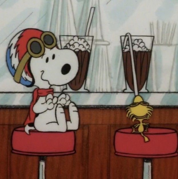 a cartoon dog sitting at a bar with two glasses and a bird on the stool