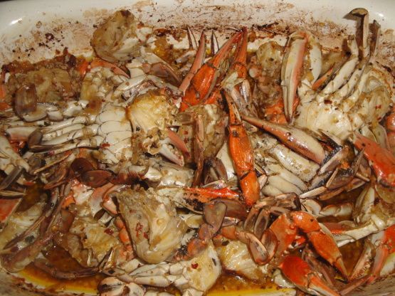 crab legs and claws are piled up in a pile