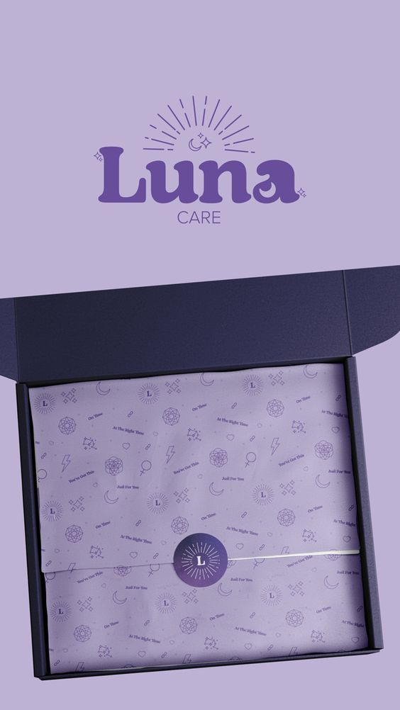 an open box with a tie in it on a purple background that says luna care