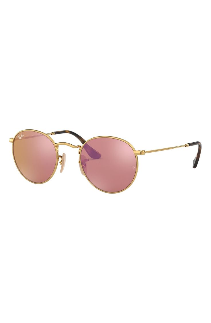 Round, retro-chic frames style eye-catching sunglasses that serve as an eclectic addition to your everyday style. 50mm lens width; 21mm bridge width; 145mm temple length. 100% UV protection. Metal/crystal lens. By Ray-Ban; made in Italy. Modern Pink Aviator Sunglasses With Uv Protection, Modern Pink Sunglasses With Tinted Lenses, Classic Pink Sunglasses With Uva Protection, Modern Pink Mirrored Aviator Sunglasses, Pink Round Frame Sunglasses For Spring, Classic Pink Sunglasses With Mirrored Lenses, Pink Round Frame Polarized Sunglasses, Modern Pink Sunglasses With Gradient Lenses, Pink Sunglasses With Mirrored Lenses And Round Frame