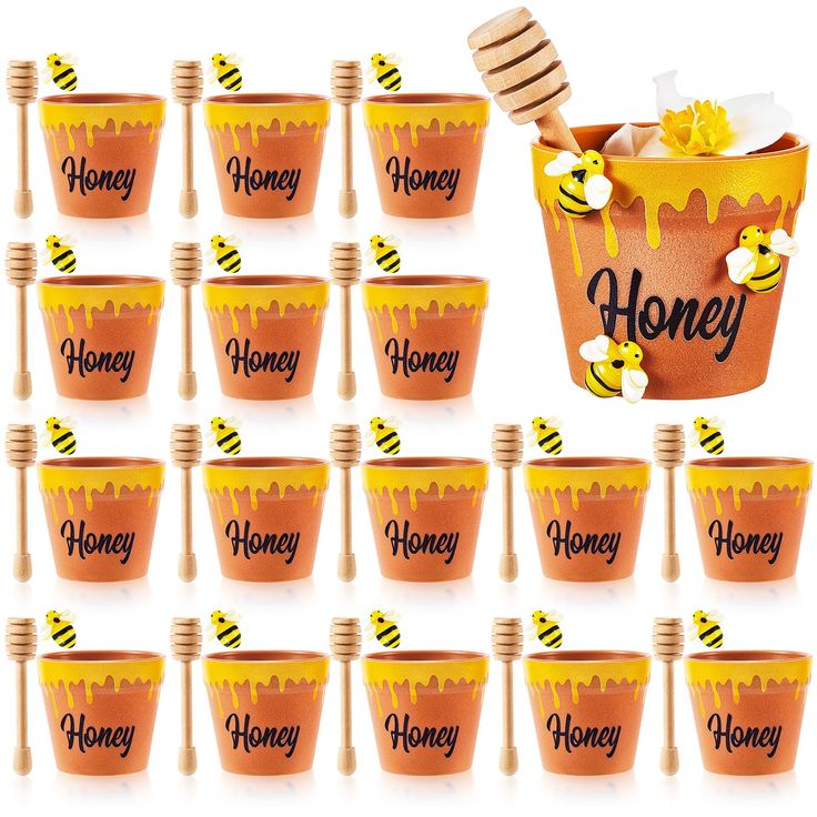 the honey cups are filled with bees and honey combs to spell out their names