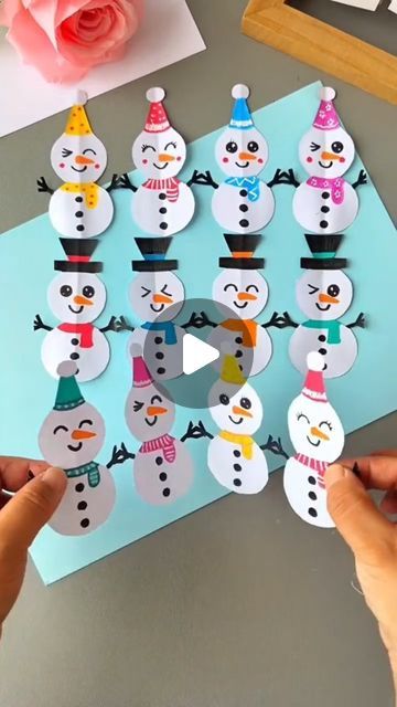 someone is making a snowman card for the kids to make it looks like they are playing