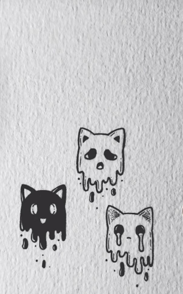 three cats drawn on paper with ink