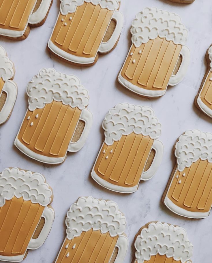 decorated cookies with beer mugs on them