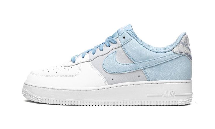 The Nike Air Force 1 Low ‘07 “Psychic Blue” is a tri-color makeup of the retro basketball and lifestyle shoe by Nike that was released in June 2021.  The “Psychic Blue” is a clean and casual look for summer and beyond that features a versatile color block consisting of white, grey, and light blue.  Smooth white leather appears on the perforated toe, lower eyelets, and forefoot.  Nike contrasts the look by constructing the mid-panel and middle eyelets in Football Grey tumbled leather.  Nike compl Air Bra, Nike Casual, White Air Forces, Retro Basketball, Color Makeup, Nike Air Force 1 07, Blue Heels, Nike Air Force 1 Low, Mens Nike Air