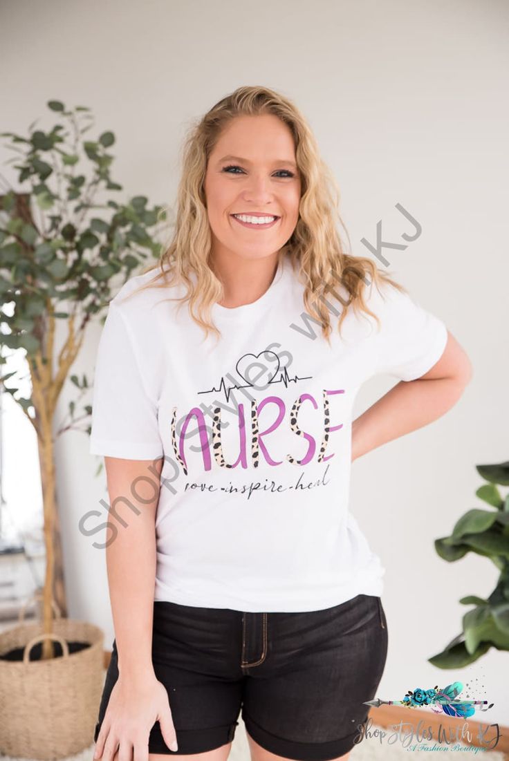 Nurse Graphic Tee Celebrate all you do as a nurse with this cute nurse graphic tee! Pair it with Judy Blues and your favorite Kayaks any day of the week. Fabric Content: 100% cotton Shirt Brand: Next Level Sizing (unisex fit): XS: 0-2, S: 4-6, M: 8-10, L: 12-14, XL: 16-18, 2XL: 20-22, 3XL: 24-26 Models:Alicia (blonde hair): 5'5" size small top, size 4 bottoms Mattie (curly brunette hair): size medium top, size 8 bottomsKim (straight brunette hair): 5'7" size 2XL top, size 20 bottoms XS: Chest: 3 White Relaxed Fit T-shirt For Nursing, White Nursing T-shirt With Letter Print, White Letter Print T-shirt For Nursing, White Cotton Nursing T-shirt, White Relaxed Fit Nursing T-shirt, Nursing Cotton T-shirt With Letter Print, Casual Cotton T-shirt For Nursing, Casual Relaxed Fit Nursing T-shirt, Pre-shrunk Nursing T-shirt With Crew Neck