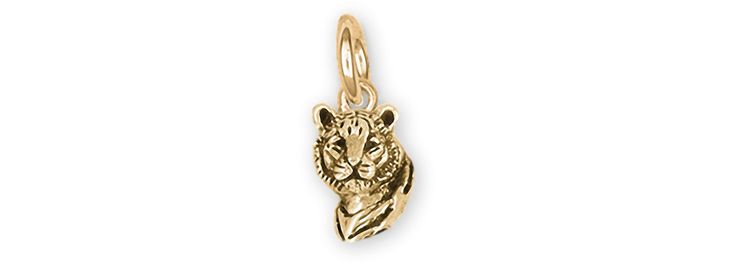 Our Tiger Charm weighs approximately 2.8 grams. This design measures approximately  1/2 inch high (12.7 mm) .  This is an original handmade Esquivel and Fees Tiger Charm jewelry design. Our Tiger Charm jewelry is hand cast, when you place your order, using the lost wax casting process and is hand finished. Please allow extra time while we make these for you.     Our handmade Tiger Charm is a perfect addition to your charm bracelet.  If you have a slide bracelet, we can also ship this with a spec Symbolic Yellow Gold Jewelry With Charms, Handmade Yellow Gold Pendant Charms, Handmade Yellow Gold-plated Charms, Classic Hallmarked Nugget Jewelry, Traditional Yellow Gold Jewelry With Charms, Traditional Polished Yellow Gold Jewelry, Traditional Yellow Gold Jewelry With Polished Finish, Symbolic Sterling Silver Charms In Yellow Gold, Symbolic Yellow Gold Sterling Silver Charms