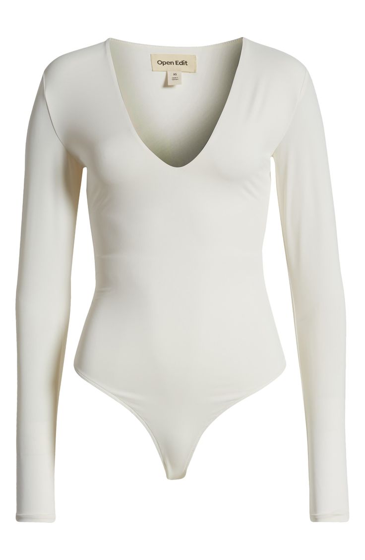 Every closet needs this sleek bodysuit made from soft, stretchy fabric designed for a skin-tight, contoured fit and styled with a V-neckline and long sleeves. V-neck Long sleeves 87% polyamide, 13% elastane Machine wash, line dry Imported Elegant White Second-skin Bodysuit, White Fitted Smoothing Bodysuit, Fitted White Smoothing Bodysuit, White Second-skin Bodysuit With Lined Body, White Stretch Elastane Bodysuit, White Stretch Smoothing Bodysuit, High Stretch Smoothing White Bodysuit, Elegant White Seamless Bodysuit, Elegant Second-skin V-neck Bodysuit