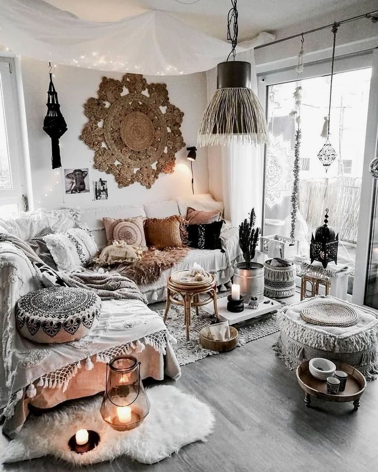 a living room filled with lots of furniture and decor