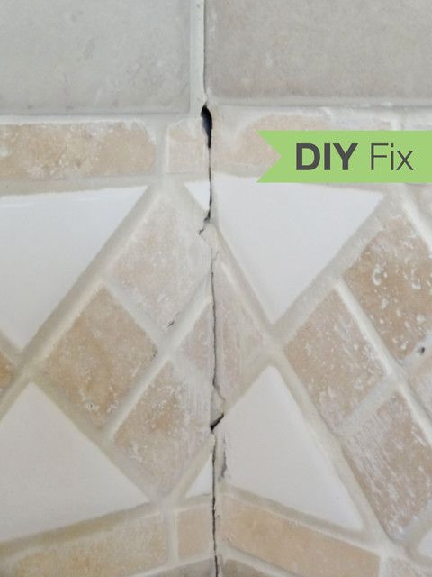 two tiles that have been torn off with the words diy fix on them