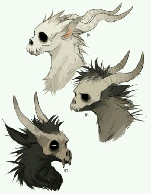 three different types of animal heads with horns and hair on them, one is white and the