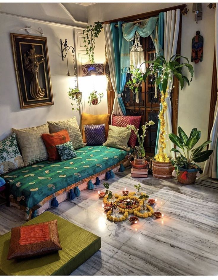 a living room filled with lots of furniture and plants