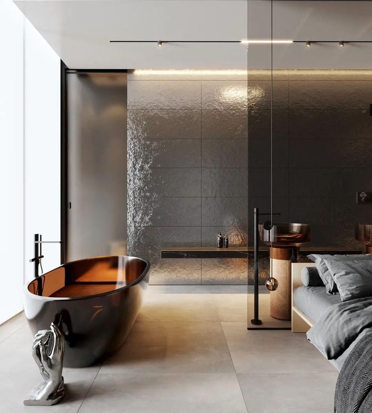 a bath tub sitting next to a bed in a bedroom