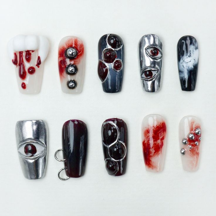 Get ready to haunt in style with our Halloween Collection! 🎃👻 From eerie cat eye gels to spooky claws, these designs are perfect for your ultimate Halloween look. Shop now and slay the season -- #donailsar #pressonnails #halloweennails #cateyegel #pressons #nails Scorpion Nails Designs, Scary Nail Designs, Creepy Nail Art, Creepy Halloween Nails, Eye Nail Design, Scary Nail Art, Slay Nails, Pressons Nails, Scary Nails