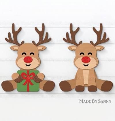 three wooden reindeers with red nose and antlers on their heads, one holding a present box