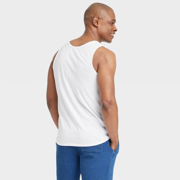 Bring cool comfort to warm-weather days with this Standard-Fit Tank Top from Goodfellow & Co™. Crafted from a lightweight jersey fabric, this standard-fit tank top offers you all-day cool comfort. Falling at the hip for wearing tucked in or untucked, you can coordinate this solid round-neck tee with different bottoms, or layer it under a button-down or hoodie for versatile styling. Goodfellow & Co™: Where style & fit are always in good company. Cool Kicks, Weather Day, Round Neck Tees, Men's Tank, Workout Tank Tops, Good Company, Jersey Fabric, Summer Style, Running Errands