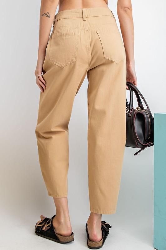 Old-school straight-leg pants cut that hit at the high waist with an easy fit through the hips. -Color: Khaki -Front/ Back pockets -Loose fit -Button and zip fly -No stretch -Content: 100% Cotton -Imported -Inseam 26" Small (0-4) Medium (4-8) Large (8-12) Casual Business Pants In Solid Color, Casual Solid Color Pants For Business Casual, Casual Solid Color Business Casual Pants, Baggy Straight Leg Spring Chinos, Spring Baggy Tapered Leg Chinos, Spring Baggy Straight Leg Chinos, Casual High Waist Work Pants With Welt Pockets, Relaxed Fit High-waisted Chinos, Fall Chinos Straight Pants