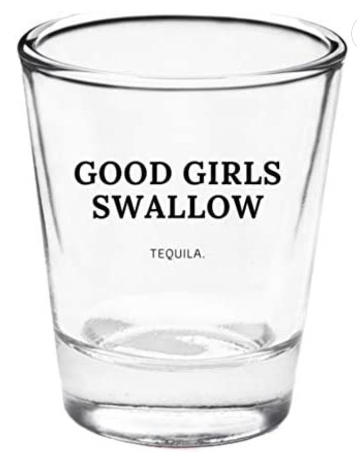 a shot glass with the words good girls swallow in black ink on it