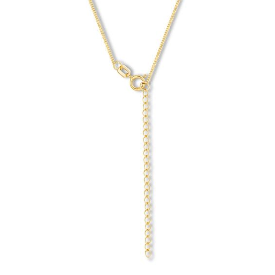 This essential curb chain in solid 14K yellow gold is scaled to a child's size, and is adjustable from 13 inches to 15 inches. The chain is approximately .69mm in width and secures with a spring ring clasp. Yellow Gold Link Charm Necklaces With Adjustable Chain, Adjustable Yellow Gold Oval Link Necklace, Adjustable Classic Yellow Gold Chain Necklace, Classic Adjustable Yellow Gold Chain Necklace, Adjustable Round Curb Chain Jewelry, Adjustable Curb Chain Jewelry, Yellow Gold Charm Necklace With Adjustable Snake Chain, Adjustable Gold Plated Cable Chain Necklace, Adjustable Gold-plated Cable Chain Necklace