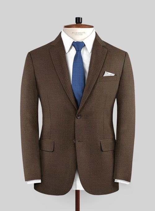 Simple but effective, the Worsted Brown Wool Suit offers an on-trend take on classic dressing. Crafted from a wool blend, the fabric comes with a brown hue that will help you focus on the special moments and be a great addition to your wardrobe. 
 
 Look Includes  Worsted Brown Wool Fabric  Two Button Jacket Style  Notch Lapel  Faux Horn Brown Buttons  Single Vent  Three Cuff Buttons  Two Welted Pocket on Trousers   You can change the look during customization if required. 
 
Lining: Viscose; Dr Formal Brown Custom Fit Blazer, Brown Custom Fit Blazer For Formal Occasions, Elegant Brown Custom Fit Blazer, Elegant Custom Fit Brown Blazer, Brown Blazer With Concealed Placket For Business, Brown Wool Business Outerwear, Luxury Brown Tweed Jacket For Work, Fitted Wool Tweed Jacket With Pressed Crease, Brown Suits With Concealed Placket