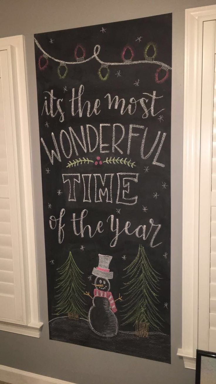 a chalkboard sign that says it's the most wonderful time of the year