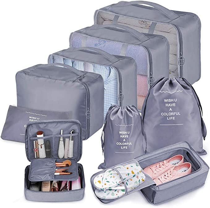 five pieces of travel bags with various items in them