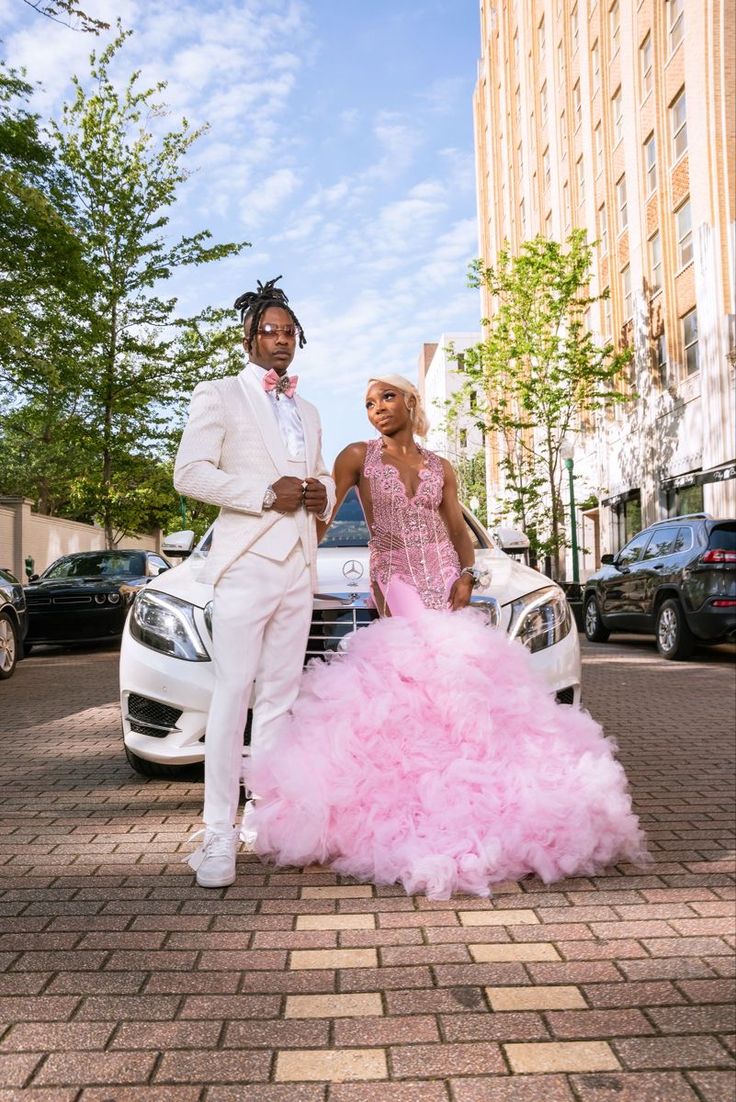 Pink And White Prom Black Couple, Pink And Silver Prom Couple, White And Pink Prom Couple, Pink Prom Ideas Black Couples, White And Pink Prom Suit, Pink And Brown Prom Couple, Pink And Brown Prom, Pink And Grey Prom Couple, Pink Prom Dresses With Date