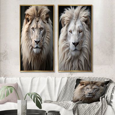 two pictures of lions on the wall in a living room