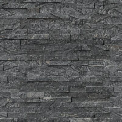 an image of a black stone wall textured with dark grey marble tiles for background